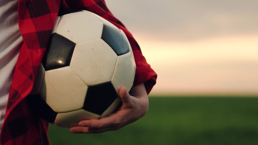 Boy With Football 1256x707